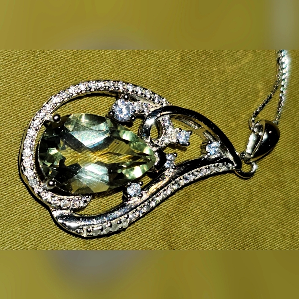 14kt white gold over silver w/ diamonds, sapphire, topaz, and 3.95 CTW amethyst